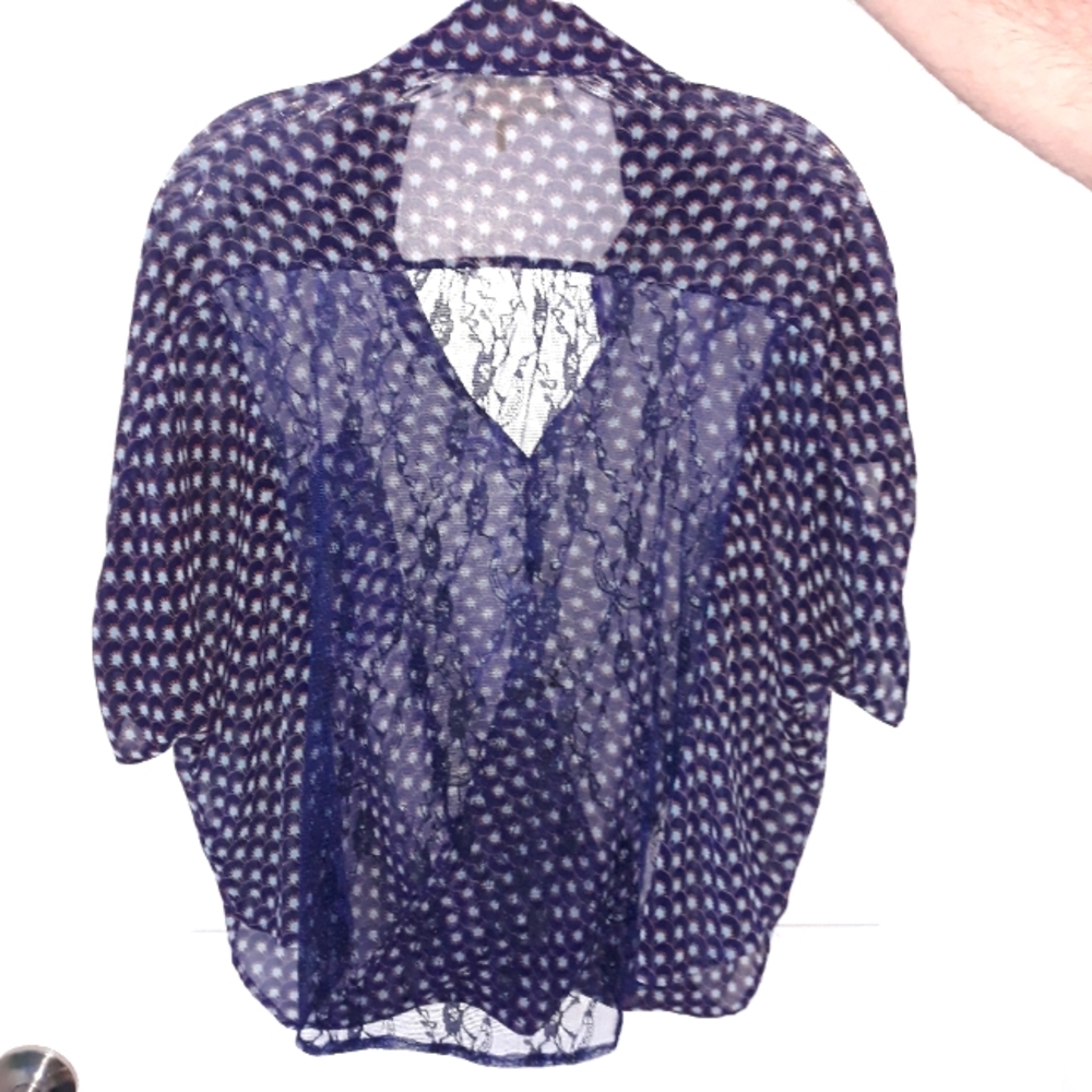 A fun and sexy A'Reve blouse in a navy print front and black lace back